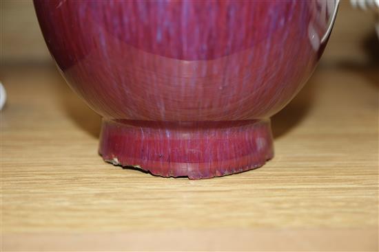 A Chinese sang-de-boeuf bottle vase, Qianlong seal mark, repair H.22cm